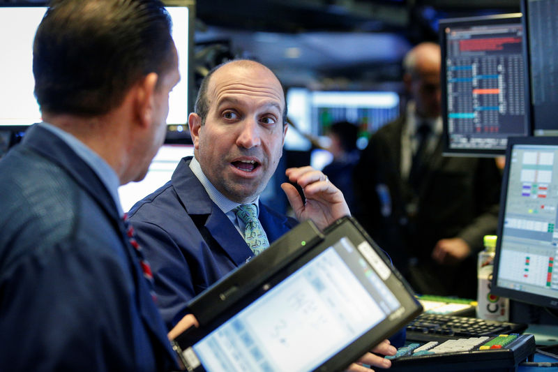 Wall Street monte, records pour le Dow et le S&P 500
